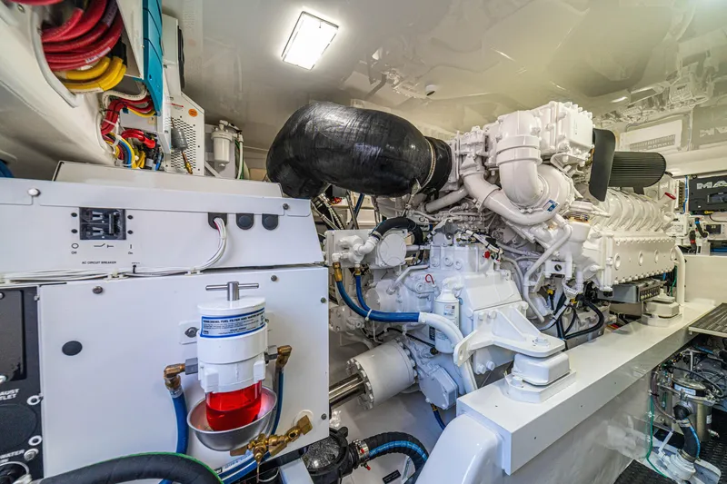 Slide: The Image of Engine room of 2026 Viking 64 Convertible yacht, showcasing advanced machinery and components. - 44