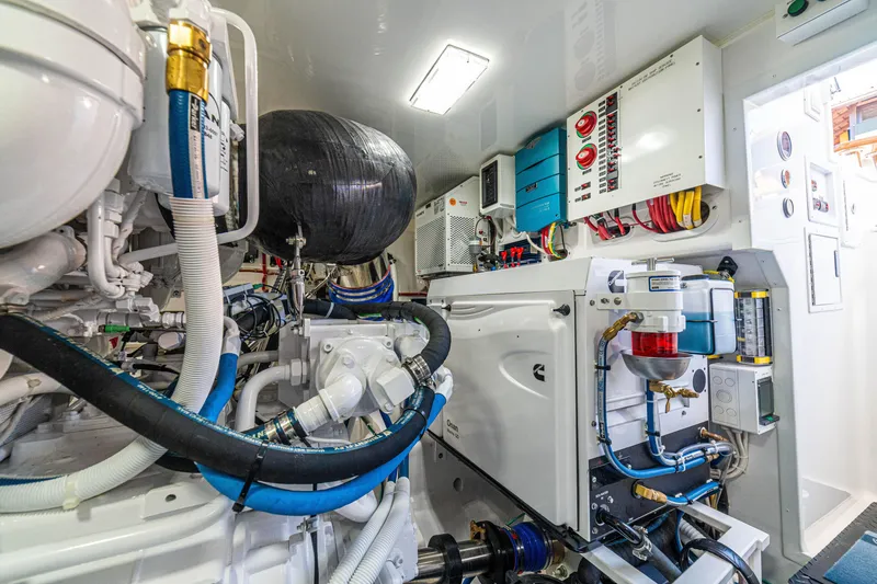 Slide: The Image of Engine room of 2026 Viking 64 Convertible yacht, showcasing advanced machinery and systems. - 46