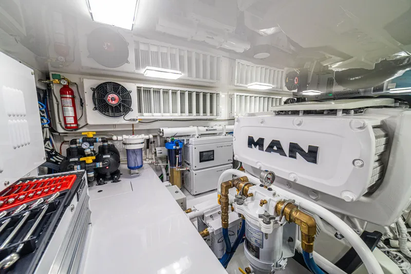 Slide: The Image of Engine room of 2026 Viking 64 Convertible yacht with MAN engine and equipment. - 51