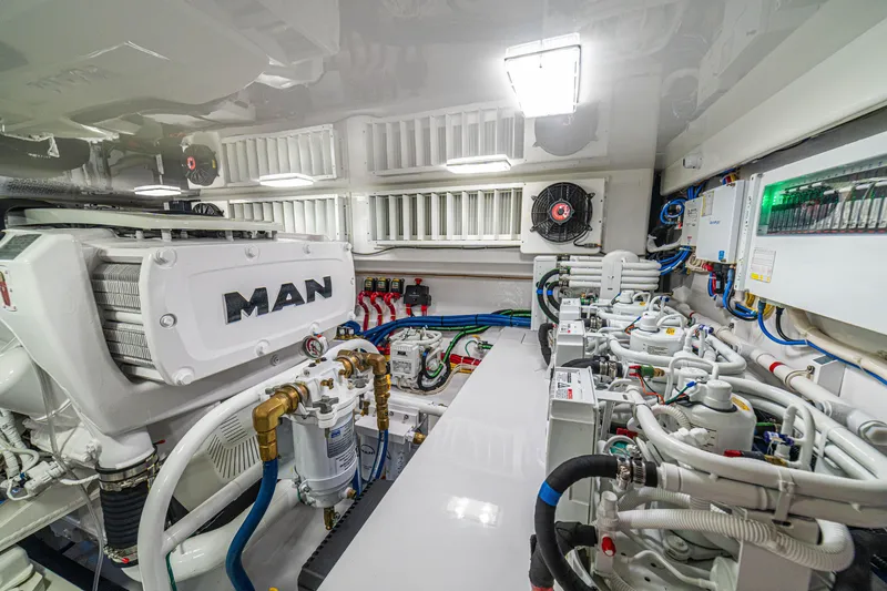 Slide: The Image of Engine room of 2026 Viking 64 Convertible yacht with MAN engine and advanced systems. - 52