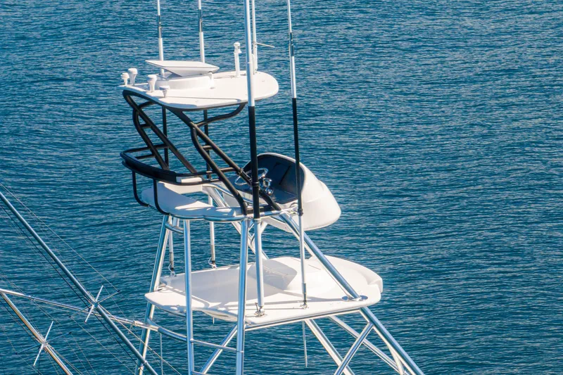 Slide: The Image of Viking 64 Convertible 2026 yacht tower against blue ocean backdrop. - 65