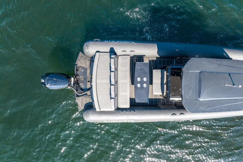 Slide: The Image of Aerial view of 2026 Highfield Sport 900 boat on water. - 7