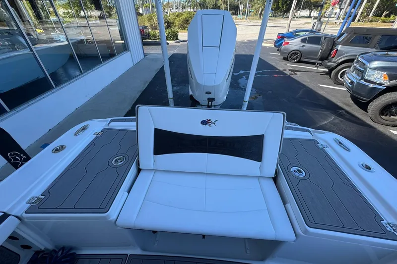 Slide: The Image of 2024 Crevalle 26 HCO boat interior with seating and storage compartments. - 12