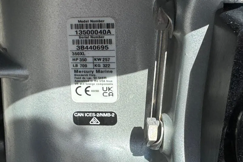 Slide: The Image of Label on Mercury Marine engine, model 350XL, showing specifications and compliance details. - 43