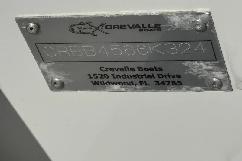 Slide: The Image of 2024 Crevalle 26 HCO boat identification plate with address details. - 44