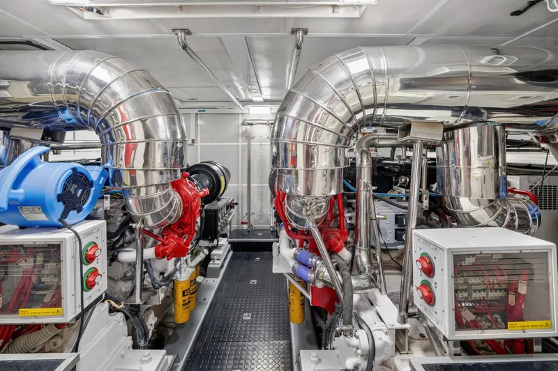 Slide: The Image of Engine room of a 2009 Horizon Flybridge yacht with polished metal components. - 35
