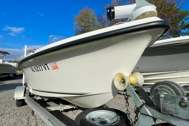 Slide: The Image of 2013 Key West 172 SE boat on trailer under clear blue sky. - 3