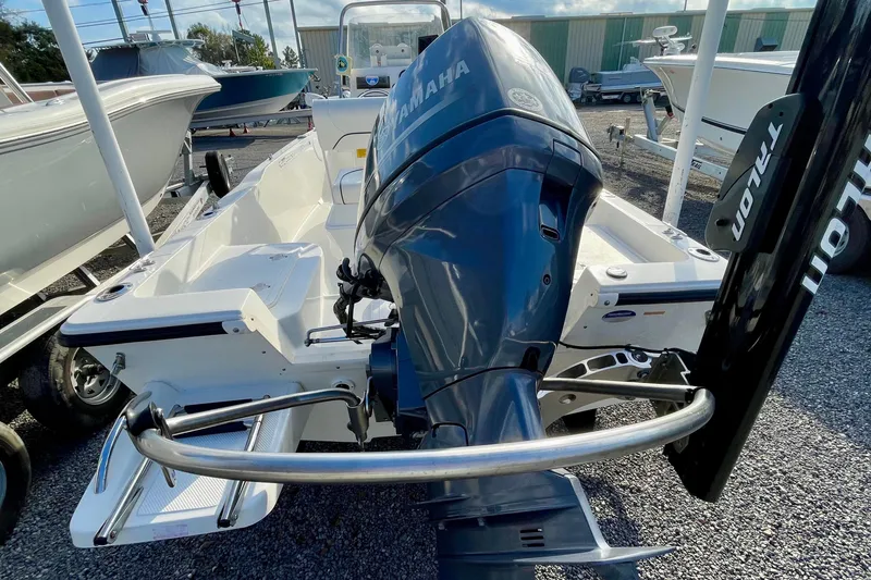 Slide: The Image of 2013 Key West 172 SE boat with Yamaha outboard motor, displayed outdoors. - 5