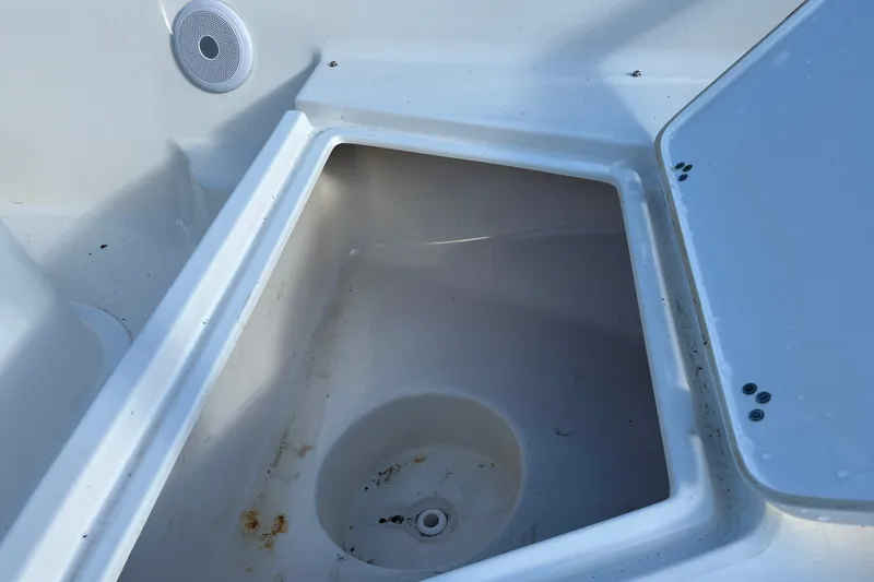 Slide: The Image of Open storage compartment on a 2022 Key West 1720 Sportsman boat. - 15