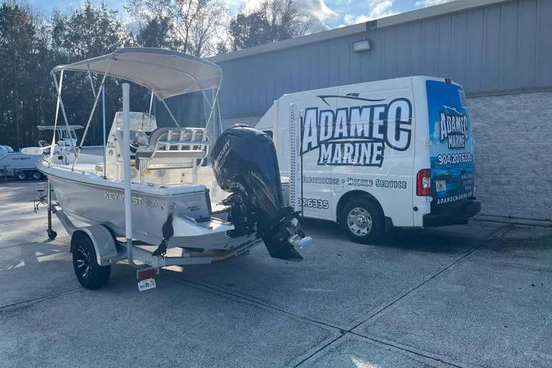 Slide: The Image of 2022 Key West 1720 Sportsman boat with Adamec Marine service van. - 4