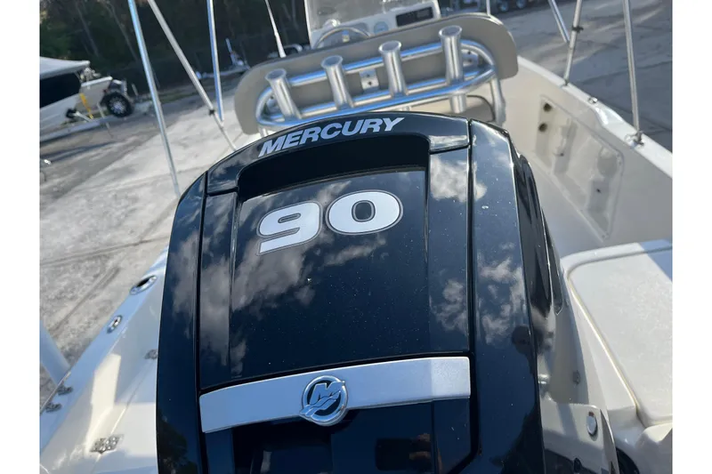 Slide: The Image of 2022 Key West 1720 Sportsman with Mercury 90 engine, outdoor setting. - 6