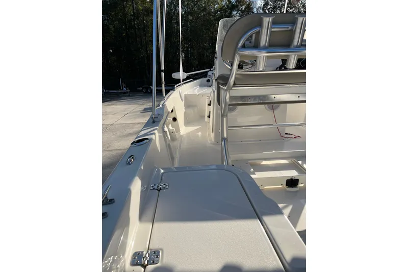 Slide: The Image of 2022 Key West 1720 Sportsman boat interior with seating and storage compartments. - 9