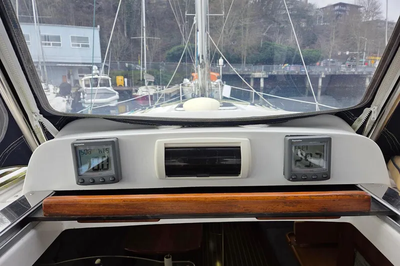 Slide: The Image of Raymarine speed and depth above companionway - 13