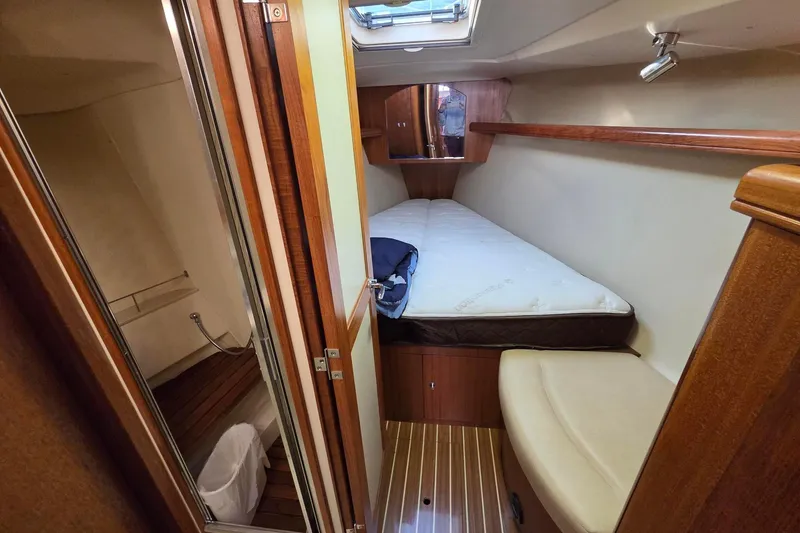 Slide: The Image of Large forward vee berth with side seating - 6
