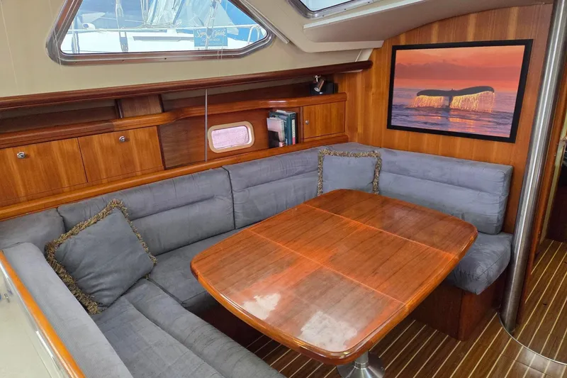 Slide: The Image of Luxurious interior of 2007 Hunter 44 Deck Salon with spacious salon table and seating - 8
