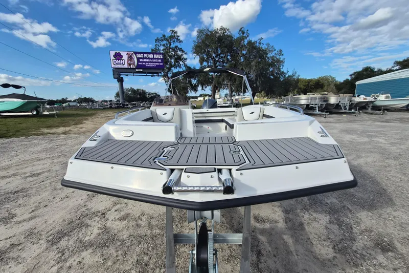 Slide: The Image of 2026 Starcraft SVX 191 OB boat on display under a clear blue sky. - 14