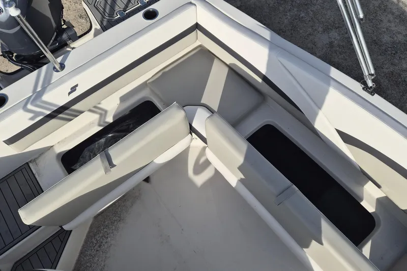 Slide: The Image of 2026 Starcraft SVX 191 OB boat interior with open storage compartments. - 8