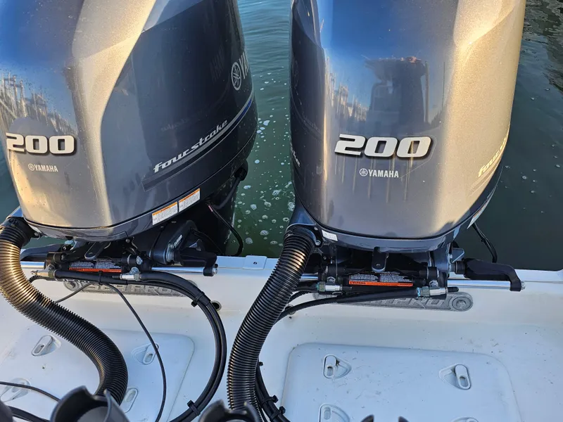 Slide: The Image of Twin Yamaha 200 outboard engines on 2021 Sea Pro 259 Center Console boat. - 12