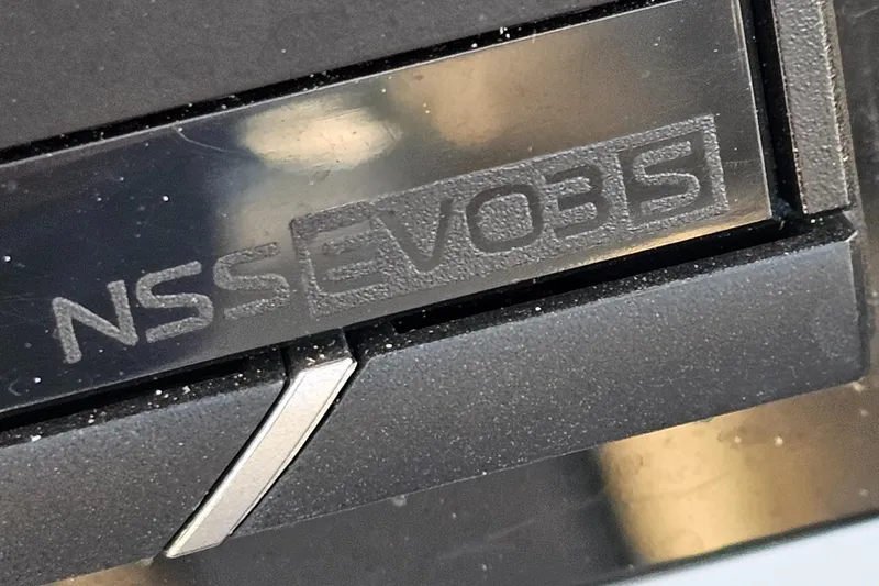 Slide: The Image of Close-up of NSS EVO3S logo on 2021 Sea Pro 259 Center Console. - 13