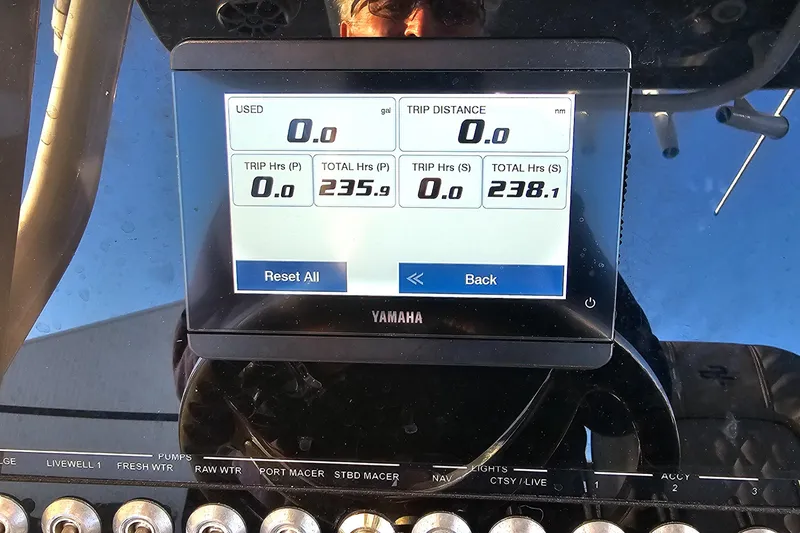 Slide: The Image of Yamaha display on 2021 Sea Pro 259 Center Console showing trip and engine hours. - 7