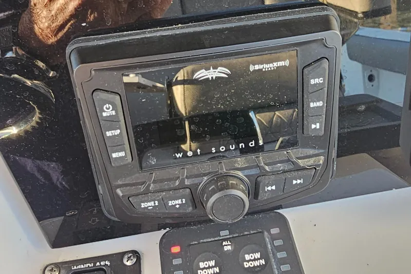 Slide: The Image of Wet Sounds audio system on 2021 Sea Pro 259 Center Console boat dashboard. - 9