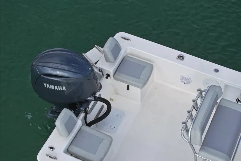Slide: The Image of 2024 Bay Rider 2460 Skiff with Yamaha engine, featuring spacious seating and sleek design. - 25