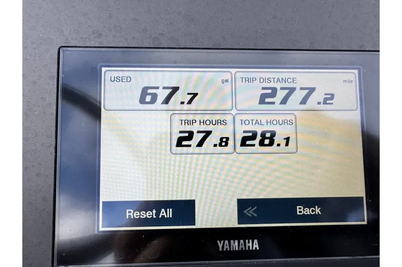 Slide: The Image of Yamaha display showing fuel usage, trip distance, and hours for 2024 Bay Rider 2460 Skiff. - 29