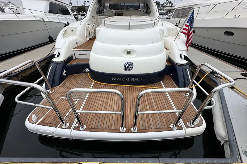 Slide: The Image of Sunseeker Predator 60 yacht, 2000 model, docked at Newport Beach marina. - 10