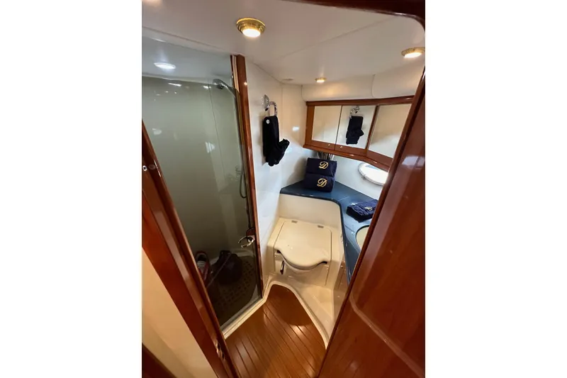 Slide: The Image of Luxurious bathroom interior of 2000 Sunseeker Predator 60 yacht with wooden finishes. - 102