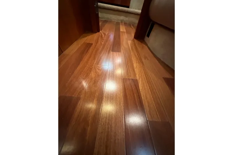Slide: The Image of Polished wooden flooring inside a 2000 Sunseeker Predator 60 yacht. - 112