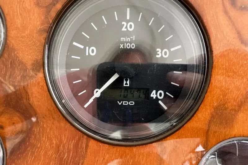 Slide: The Image of Tachometer of 2000 Sunseeker Predator 60 yacht, displaying engine RPM. - 114