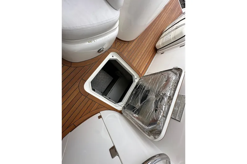 Slide: The Image of Sunseeker Predator 60 yacht hatch, 2000 model, open on teak deck. - 116