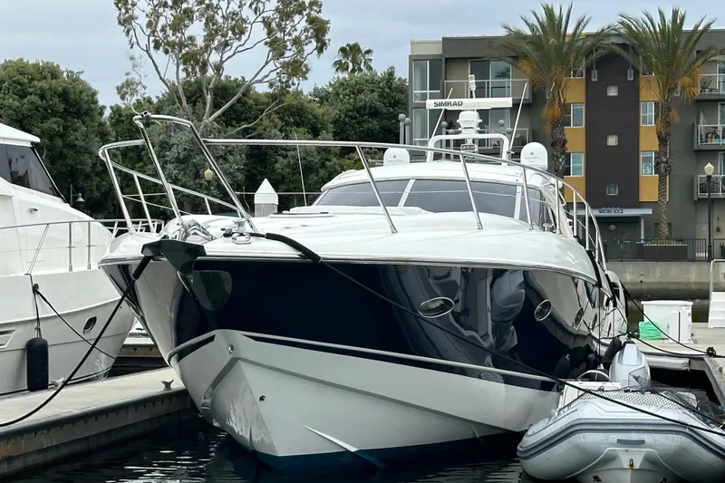 Slide: The Image of Luxury Sunseeker Predator 60 yacht docked at marina, 2000 model. - 132