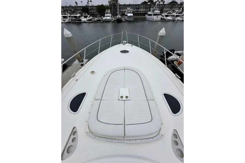 Slide: The Image of Sunseeker Predator 60 yacht deck, 2000 model, docked in a marina. - 20