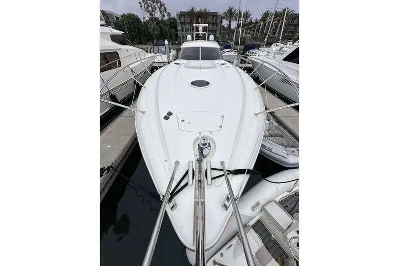 Slide: The Image of Sunseeker Predator 60 yacht, 2000 model, docked at marina, front view. - 24