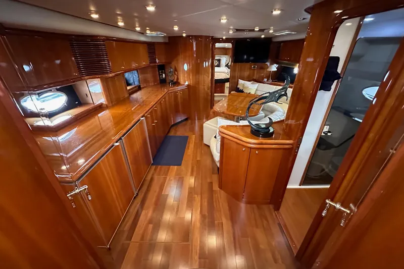 Slide: The Image of Luxurious interior of 2000 Sunseeker Predator 60 yacht with polished wood finishes. - 52