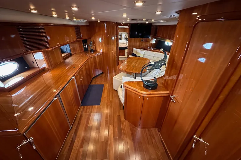 Slide: The Image of Luxurious interior of 2000 Sunseeker Predator 60 yacht with polished wood finishes. - 53