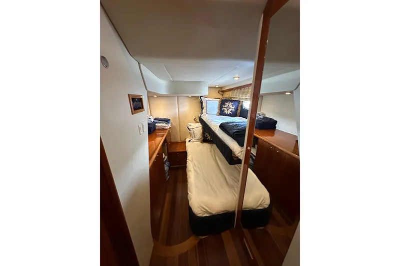 Slide: The Image of Luxurious cabin interior of 2000 Sunseeker Predator 60 yacht with elegant bedding. - 57