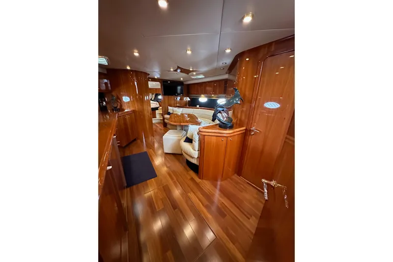 Slide: The Image of Luxurious interior of 2000 Sunseeker Predator 60 yacht with polished wood finishes. - 63