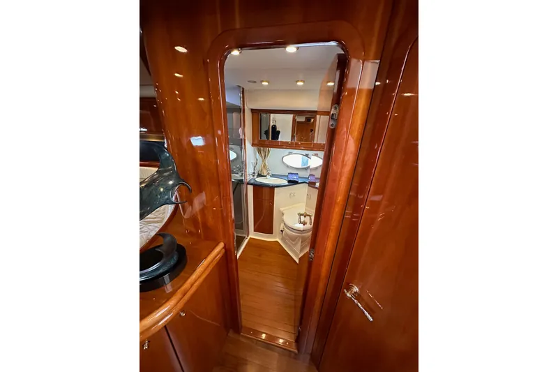 Slide: The Image of Luxurious interior of 2000 Sunseeker Predator 60 yacht with polished wood finish. - 65