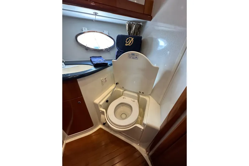 Slide: The Image of Luxury yacht bathroom with toilet and sink, Sunseeker Predator 60, 2000 model. - 69