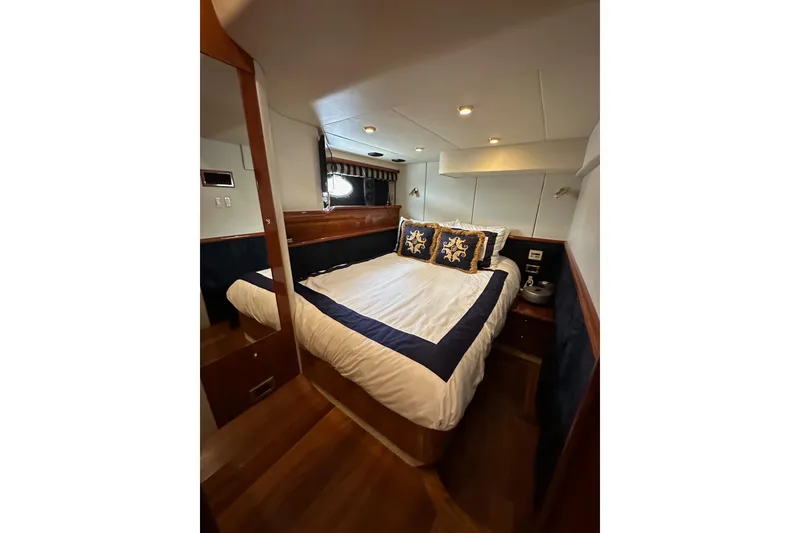 Slide: The Image of Luxurious cabin interior of 2000 Sunseeker Predator 60 yacht with elegant bedding. - 73