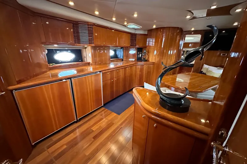 Slide: The Image of Luxurious interior of 2000 Sunseeker Predator 60 yacht with polished wood finishes. - 79
