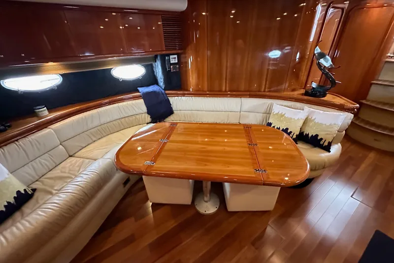 Slide: The Image of Luxurious Sunseeker Predator 60 yacht interior with elegant wood finishes and plush seating, year 2000. - 93
