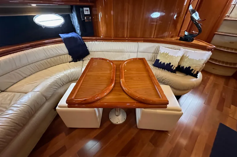 Slide: The Image of Luxurious interior of 2000 Sunseeker Predator 60 yacht with elegant wood and leather seating. - 94