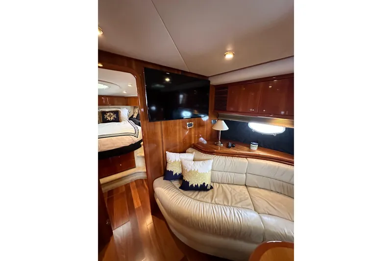 Slide: The Image of Luxurious interior of 2000 Sunseeker Predator 60 yacht with leather seating and modern amenities. - 95
