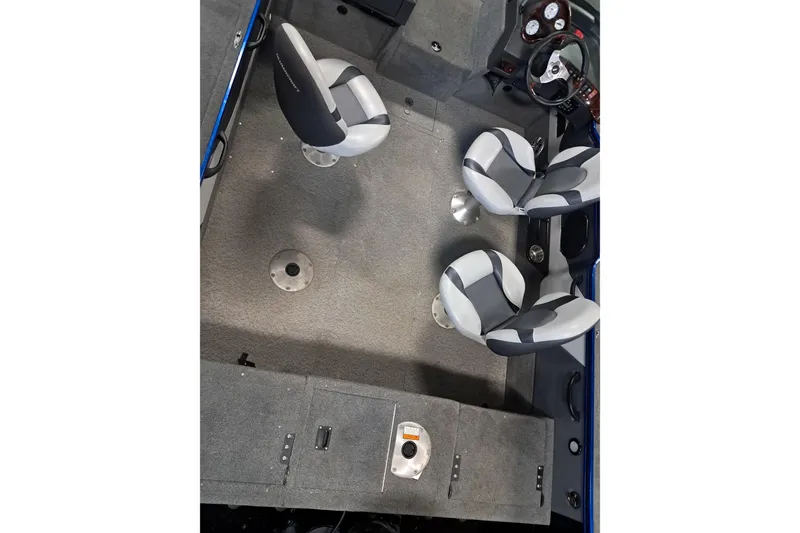 Slide: The Image of 2015 Alumacraft Trophy 175 boat interior with three seats and steering console. - 11