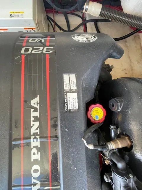 Slide: The Image of Volvo Penta 320 V8 engine in Regal 3550 Cuddy boat, year 2014. - 13