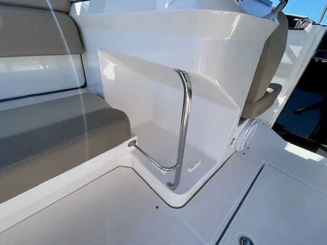 Slide: The Image of 2014 Regal 3550 Cuddy interior seating and storage area. - 19