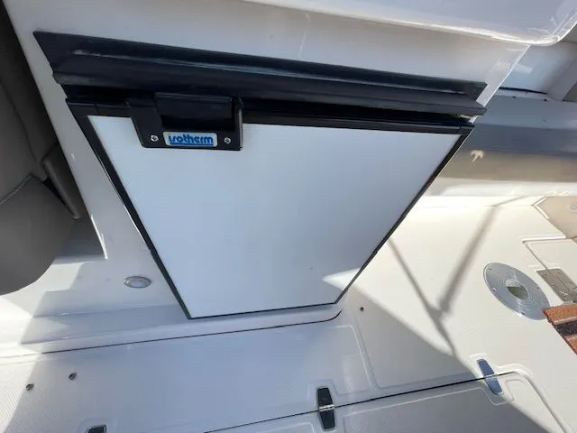 Slide: The Image of Fridge on Regal 3550 Cuddy boat, year 2014. - 22